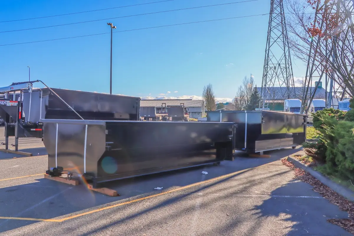 Roll-off dumpster ready for waste disposal at job site for 15 Yard Dumpster Rental in Kirkland